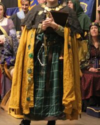 Blackthorn Bard cloak. Book visible.