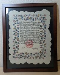 Award of Arms scroll by Lady Elspeth MacGregor of the Middle Kingdom.